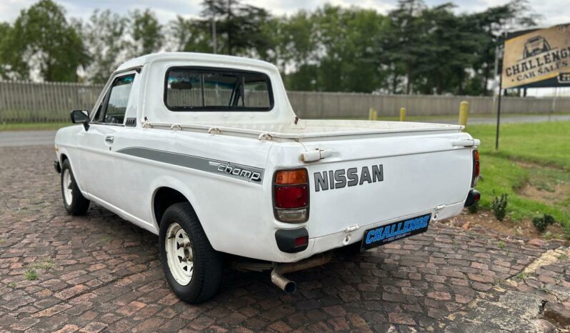 
								Nissan 1400 Champ full									