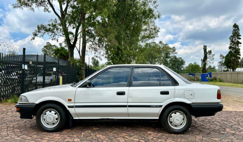 
								Toyota Corolla 1.3 L full									