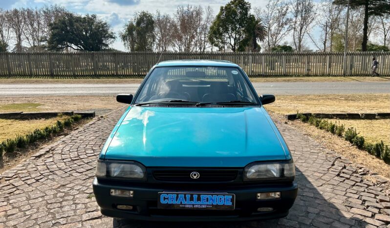 
								Mazda 323 130 Midge full									