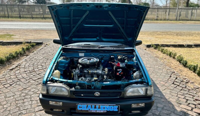 
								Mazda 323 130 Midge full									