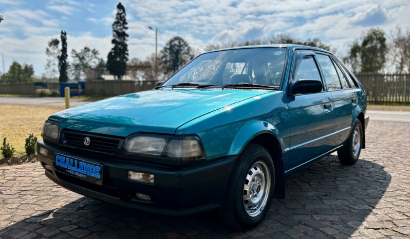
								Mazda 323 130 Midge full									