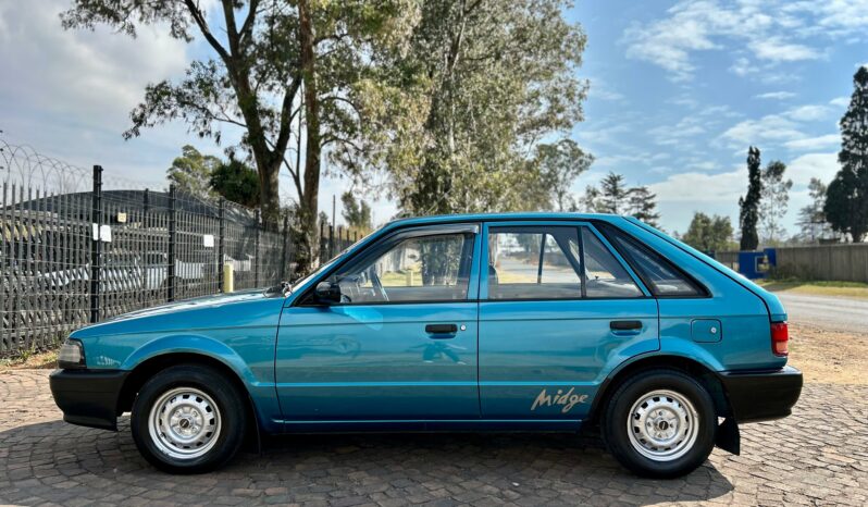 
								Mazda 323 130 Midge full									