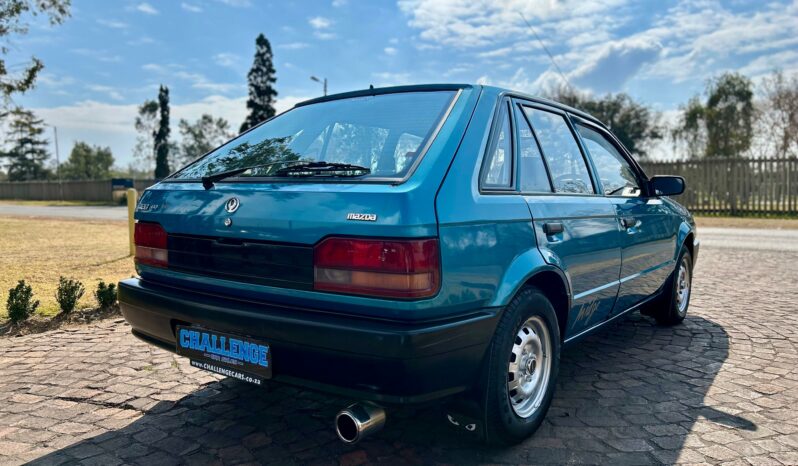 
								Mazda 323 130 Midge full									