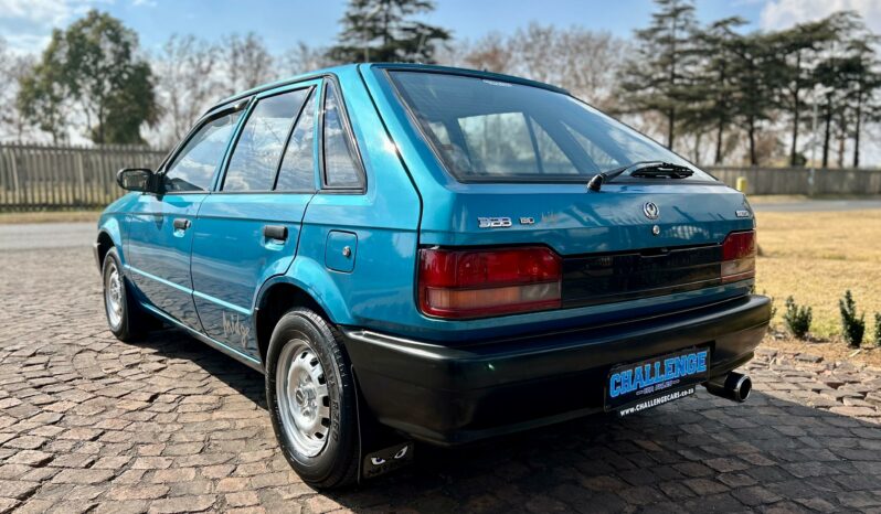 
								Mazda 323 130 Midge full									