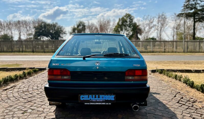 
								Mazda 323 130 Midge full									
