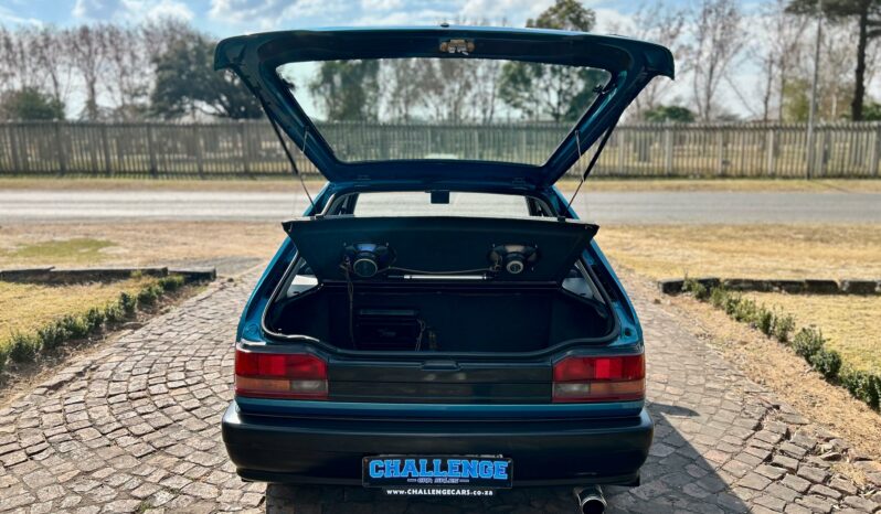 
								Mazda 323 130 Midge full									