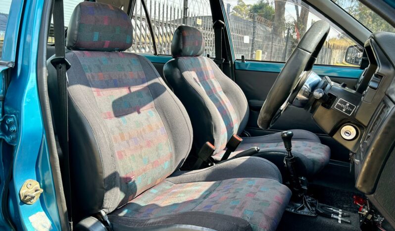 
								Mazda 323 130 Midge full									
