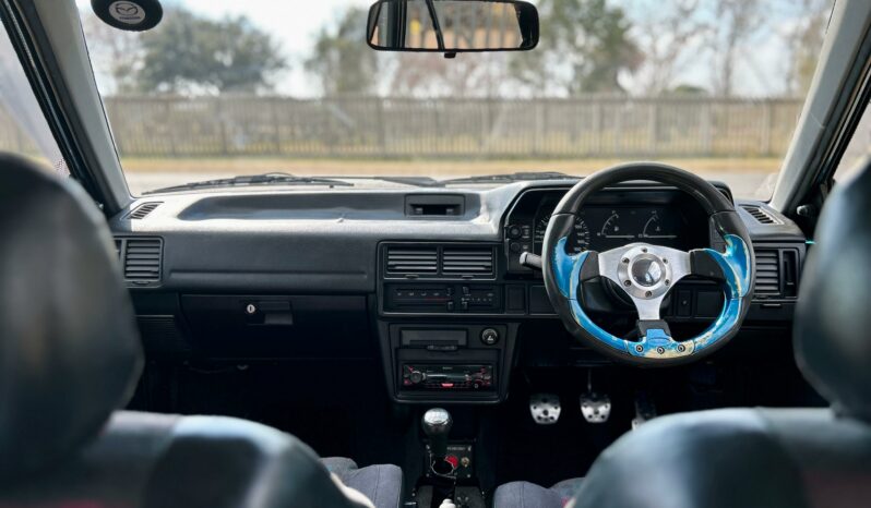 
								Mazda 323 130 Midge full									
