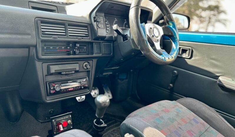 
								Mazda 323 130 Midge full									